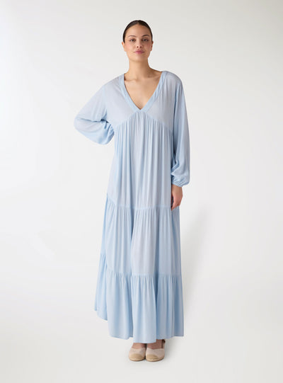 Long dress with ruffles and V-neckline